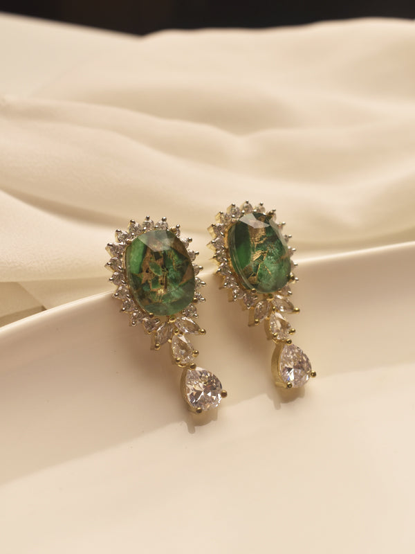 Pair of earrings with green gemstones