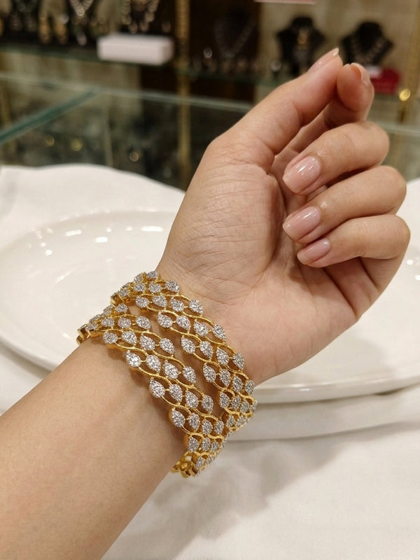 Majestic leaf interlocking golden bangles | golden bengles design for women
