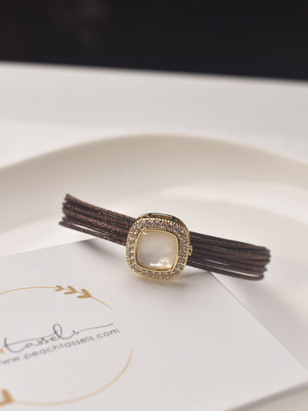 Multi Wrap Bracelet with a Golden Clasp 