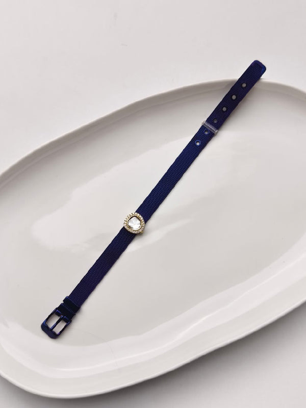 Navy blue hend band with a golden kundan