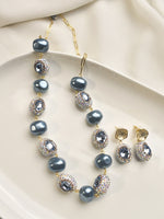 Load image into Gallery viewer, Necklace with Blue Pearls and Crystal-like Beads 
