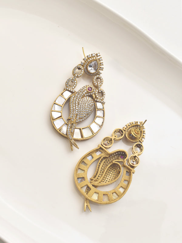 Ornate Golden Earrings with Intricate Designs 