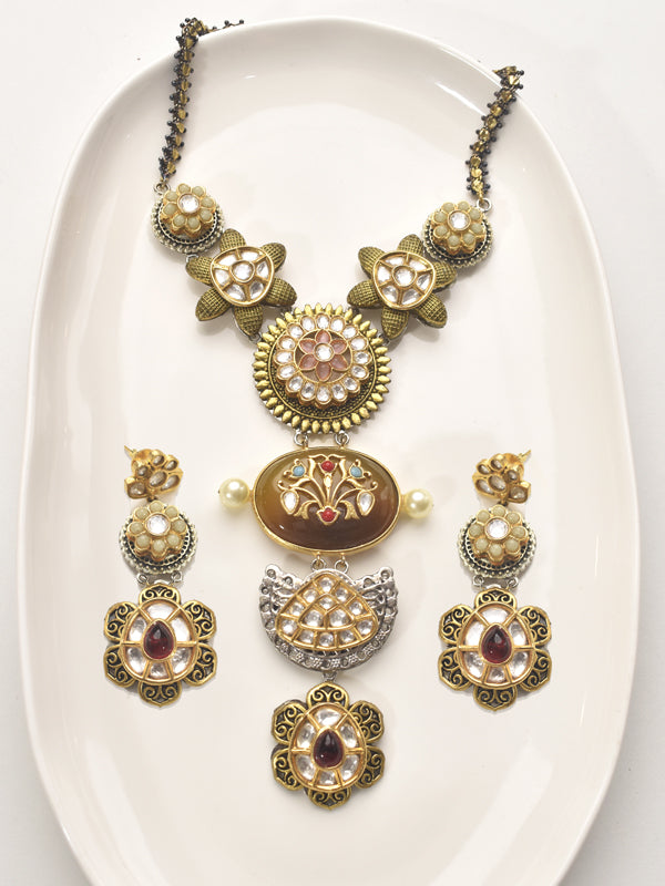 Ornate Necklace with Floral and Circular Designs 