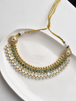 Load image into Gallery viewer, Ornate Necklace with Green and White Kundan | Necklace with Green Stones, Pearls, and Golden accents 
