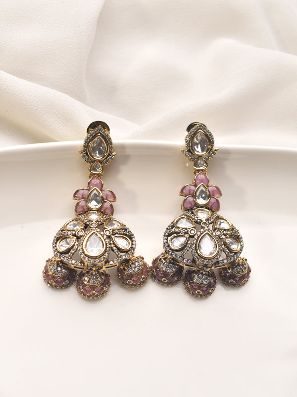 Ornate earrings with pink and clear gemstones