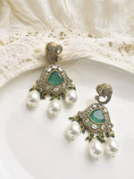 Load image into Gallery viewer, Ornate earrings with green gemstones and pearl-like beads 
