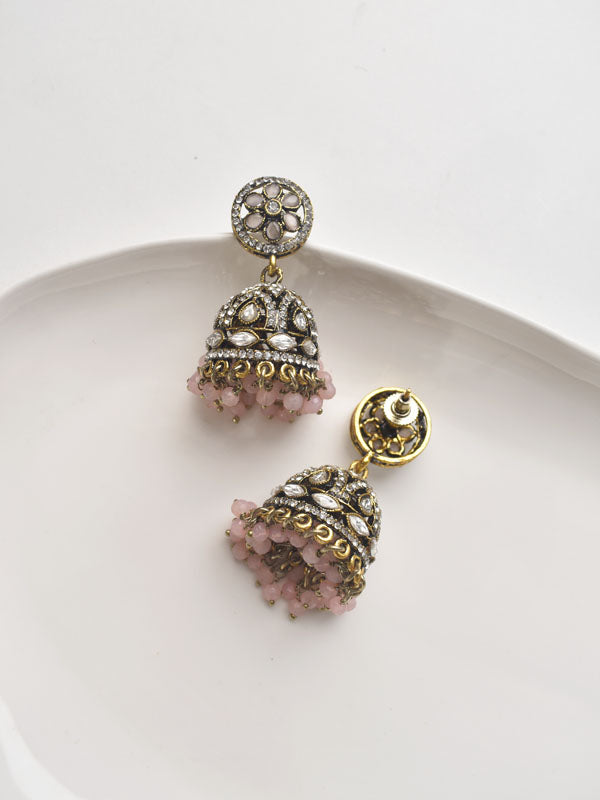 Ornate earrings with pink stones 
