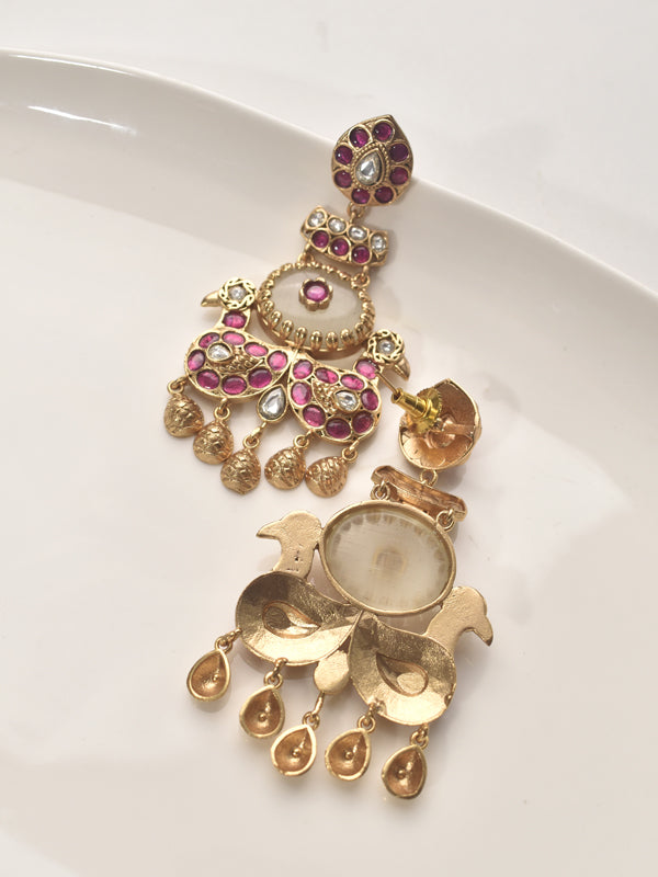 Ornate gold and pink earrings 