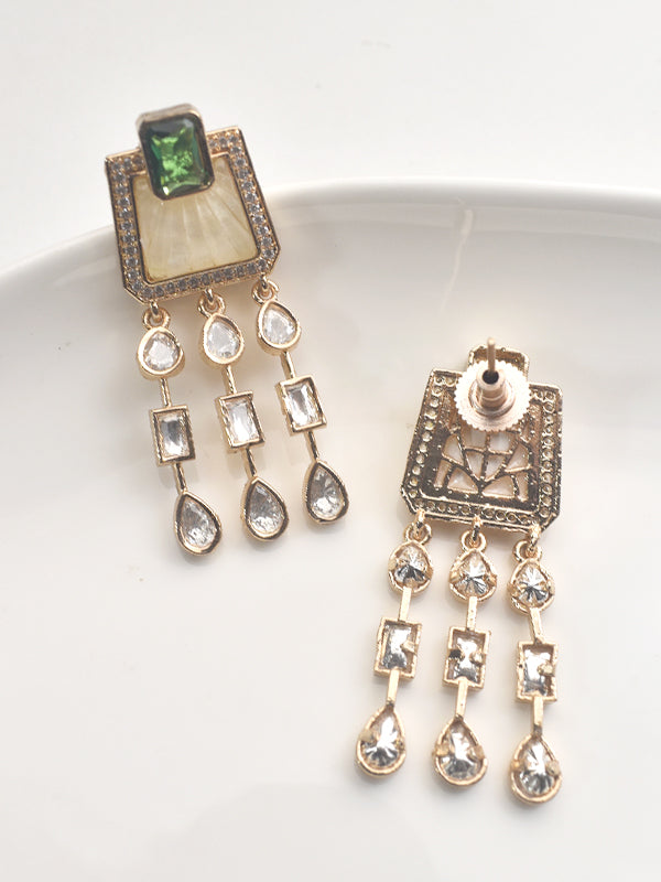 Pair of ornate earrings with gemstones 