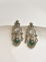 Load image into Gallery viewer, Pair of ornate earrings with green gemstones 
