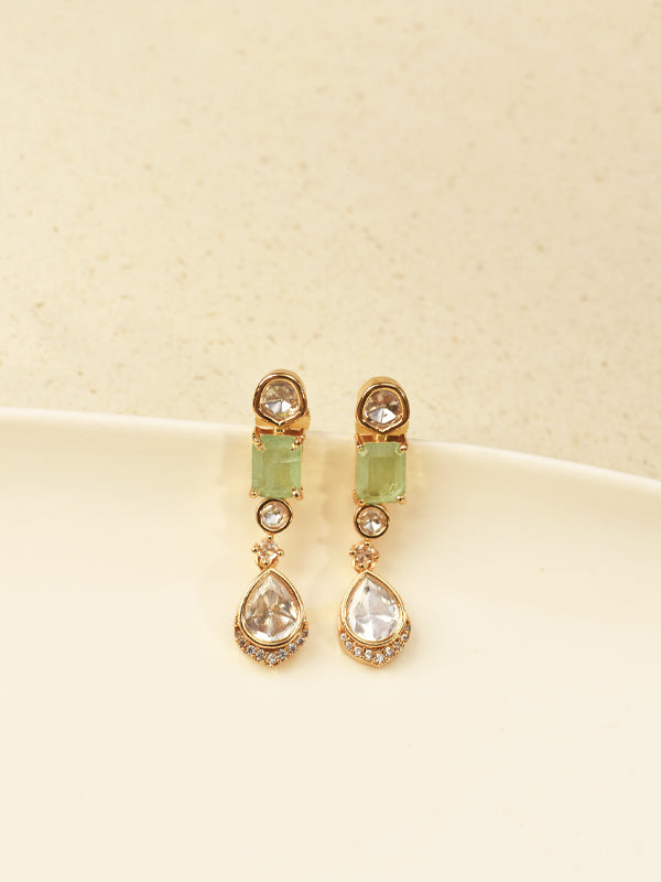 Pair of earrings with green gemstones and gold accents 
