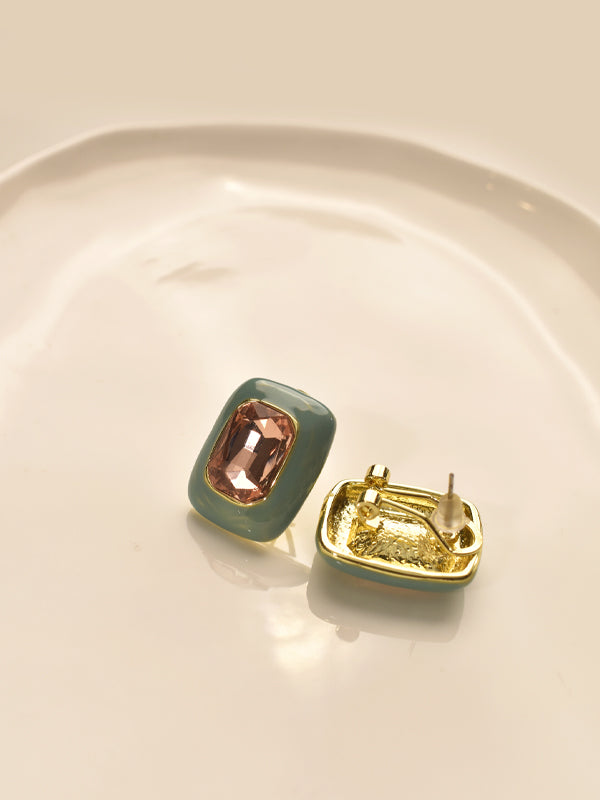Pair of earrings with a pink gemstone 