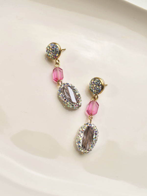 Pair of earrings with pink and clear gemstones 