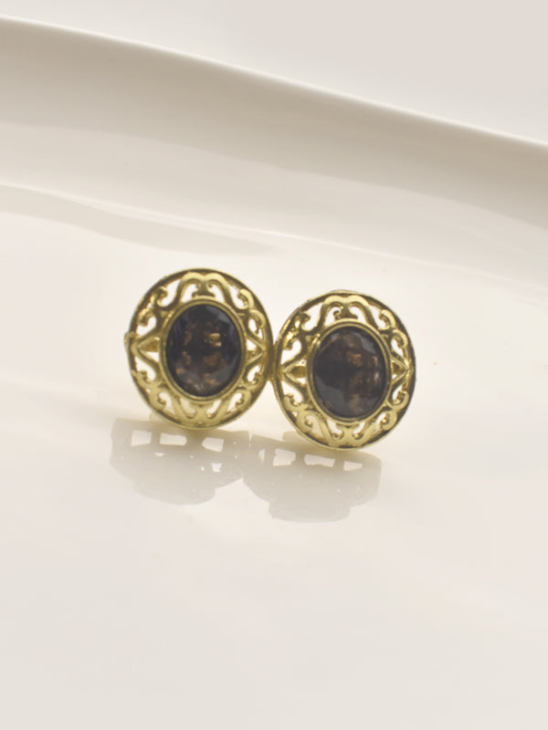 Pair of gold earrings with dark gemstones 