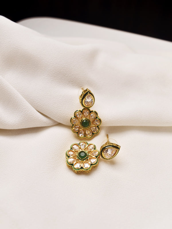 Pair of golden floral earrings with green gemstones 