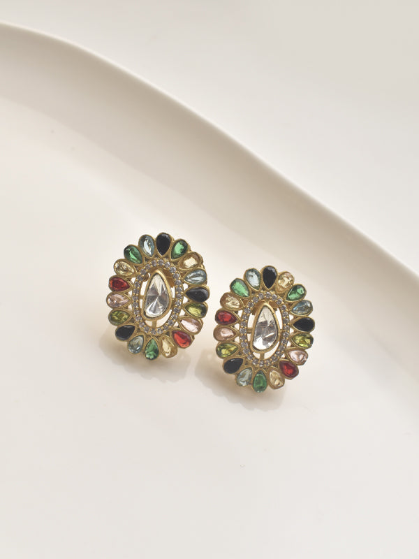 Pair of ornate earrings with colorful gemstones