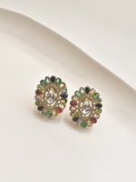Load image into Gallery viewer, Pair of ornate earrings with colorful gemstones
