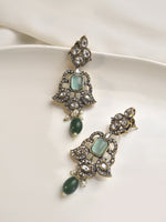 Load image into Gallery viewer, Pair of ornate earrings with green gemstones 
