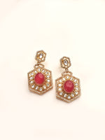 Load image into Gallery viewer, Pair of ornate earrings with red gemstone
