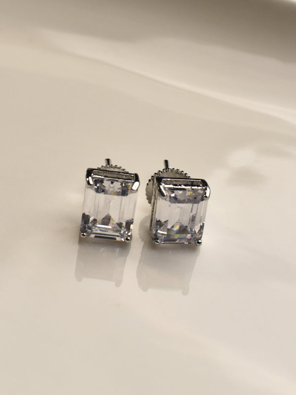 Pair of silver earrings with clear gemstones 