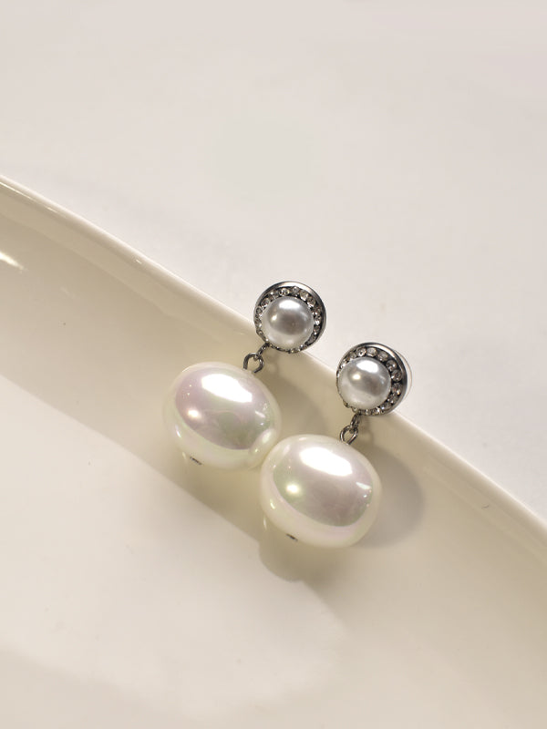 Pearl earrings.