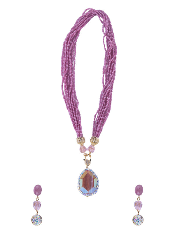 Pink beads with a large teardrop shaped pink stone pendant set 