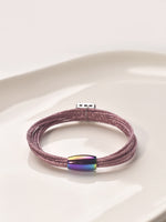 Load image into Gallery viewer, Purple beaded bracelet with a rainbow-colored clasp 
