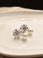 Load image into Gallery viewer, Snowflake-Shaped Earrings with White Pearls

