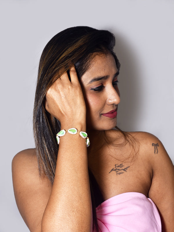 Woman wearing a Bracelet with Green Stones 