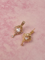Load image into Gallery viewer, gold-toned statement AD earrings
