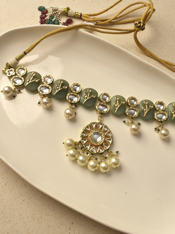 Ornate indian choker necklace with green stone beads