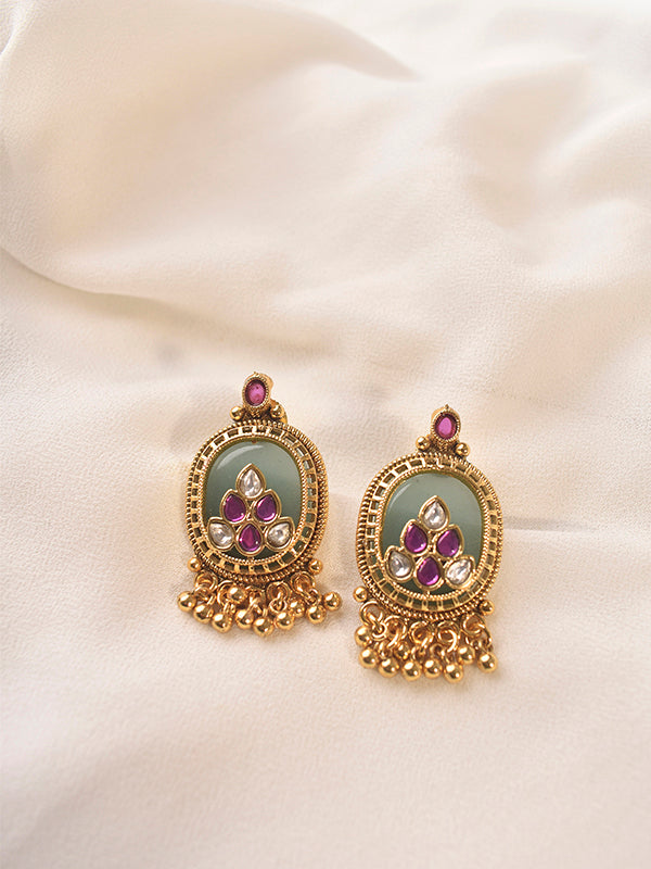 ornate earrings with gemstones 