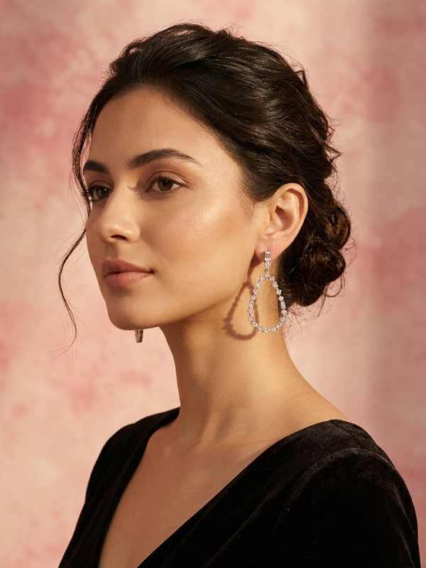 sparkling silver teardrop-shaped hoop earring