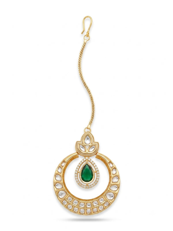 Traditional indian maang tikka earring featuring a teardrop shaped
