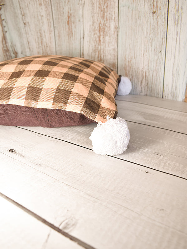 Brown and Orange Checks Cushion Covers with White Pom-Poms